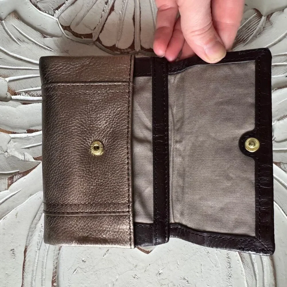 Fossil Ellis multifunction leather tri-fold wallet in brown and metallic taupe